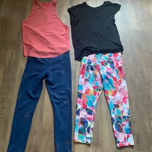 Zyia clothes. 2 pairs of leggings size 4. Two tops size small.